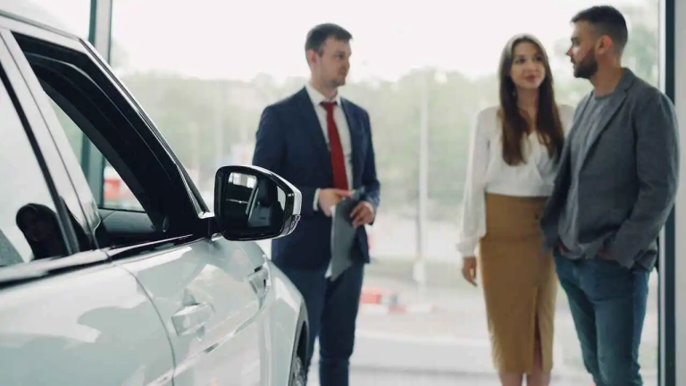 a couple buying a car